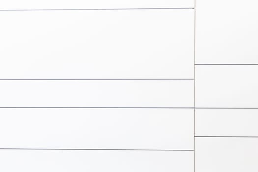 pattern of white wall with lines in harmonic compositionv