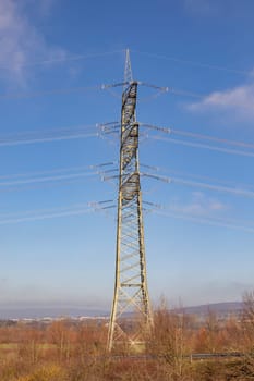 electric pylon  in Germany under blue sky