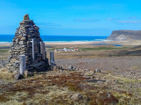 scenic view to Iceland's westfjord with stone piles as marker, Iceland