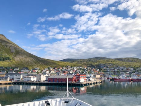 entering the harbor of Tromso at tromsdalen area in Norway by ship