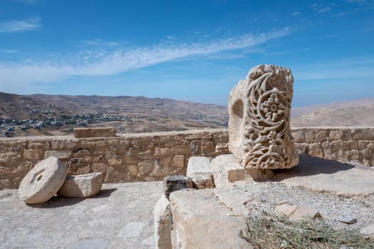 view to ancient Crusader Castle citadel of Kerak, Jordan. the carving decoration of the stone is in typical arabic style. The  Crusader Castle was built in 1142.