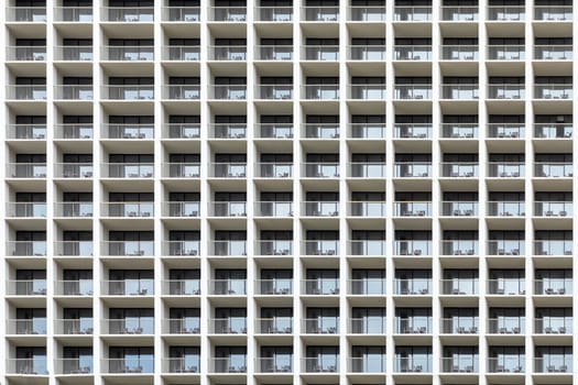 facade of skyscraper with identical apartments in the USA