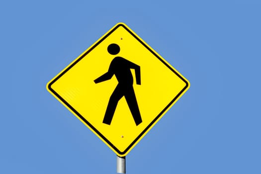 yellow pedestrian crossing or walking warning sign in Texas, USA