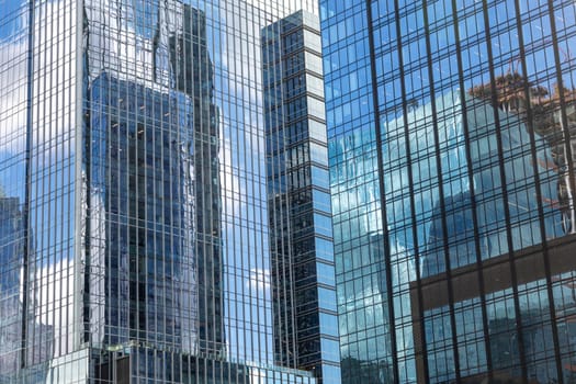 detail of reflection glass skyscraper pattern downtown