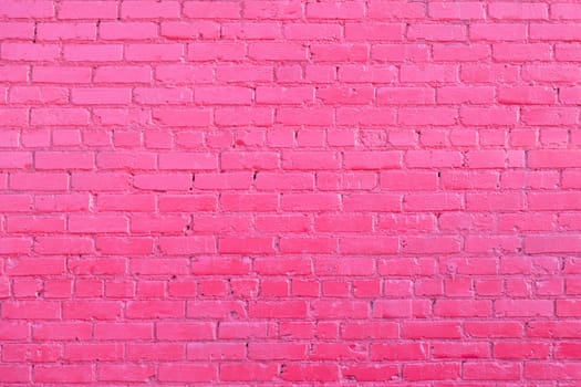 pattern of pink painted old brick wall