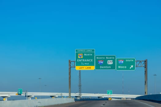 Signage denton north entrance to waco south and express lane at a highway crossing in Fort Worth, USA