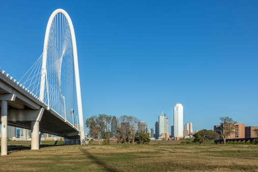 scenic skyline Panoramaof Downtown Dallas seen from Trinity River with Margaret hunt hill bridge, Texas