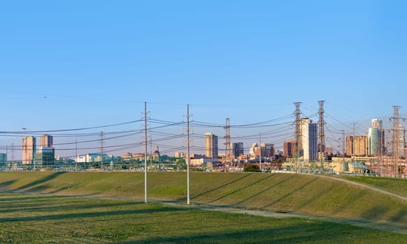 scenic skyline in late afternoon at trinity river with view to downtown Dallas, Texas, USA