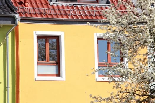 Orange residential building in spring, Bremen, Germany
