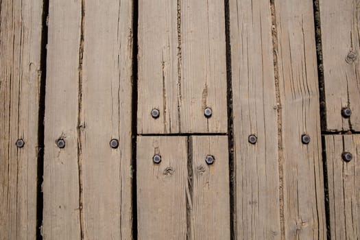 Flooring made of wooden planks for a pedestrian walkway on a hiking trail. Overhead view