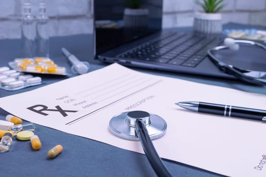 Prescription with laptop, stethoscope and pills on table. Doctor recommendation, medical exam, healthcare, doctor workplace concept