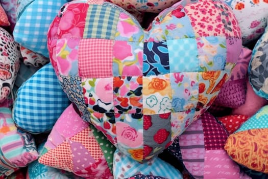 Patchwork heart made from pieces of fabric for Valentine's Day .