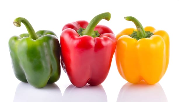 Red, green and yellow bell peppers isolated on white background. AI generated