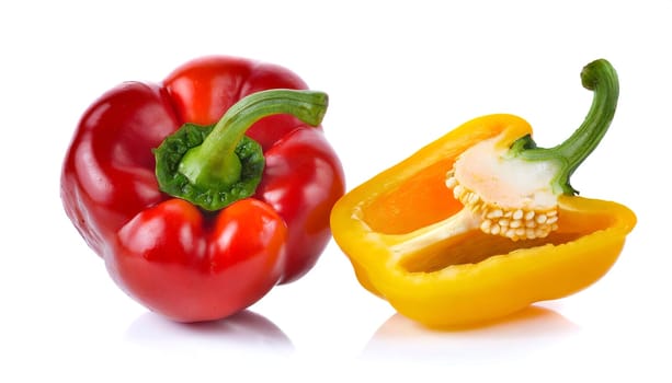 Red, green and yellow bell peppers isolated on white background. AI generated