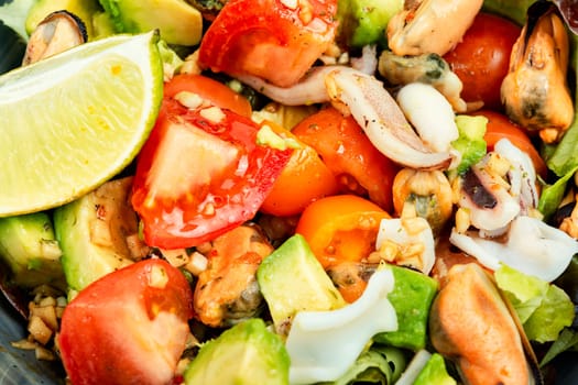 Salad with calamari, shrimp, clams and fresh vegetables.