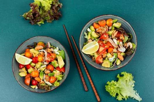 Salad with calamari, shrimp, clams and fresh vegetables.