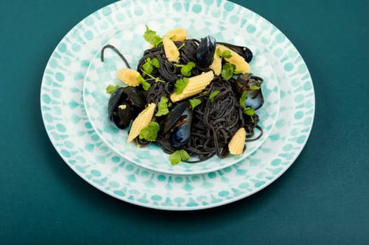 Vegan black bean pasta with clams, mussels. Mediterranean pasta vongole.