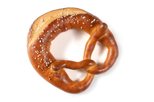 A Bavarian pretzel with salt on a white background. The pretzel is shaped like a knot and covered in a generous amount of salt. The pretzel is golden brown in color and looks crunchy and delicious.