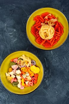 Various kinds of uncooked pasta, noodles and spaghetti. Macro.