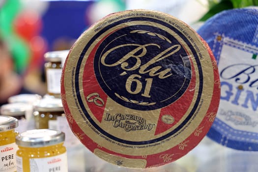 Cracow, Poland - November 5, 2021: Whole wheels of blue mold cheeses at Enoexpo and Gastrofood - Trade Fair for Food and Drinks for Catering