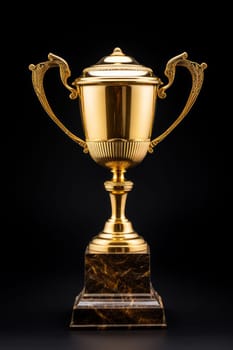 Golden Trophy isolated on black background. Concept for Victory. artificial art