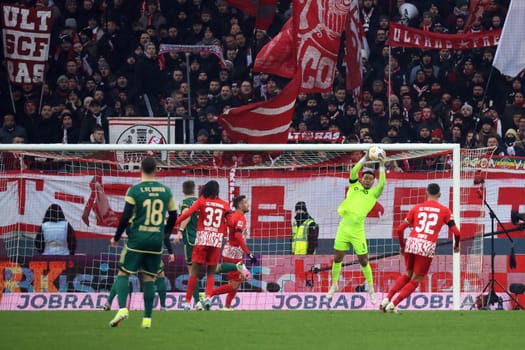Goalkeeper Noah Atubolu (SC Freiburg) intercepts the ball safely during the match of the 1. FBL: 23-24: 17 Sptg. SC Freiburg - 1. FC Union Berlin  DFL REGULATIONS PROHIBIT ANY USE OF PHOTOGRAPHS AS IMAGE SEQUENCES AND/OR QUASI-VIDEONann  Photo: Joachim Hahne/johapress
