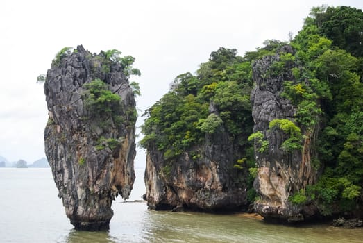 The nature of the coast of Thailand, cliffs near the sea, coastline and mountains.
