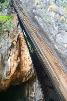 Crack in the rock in the mountains of Thailand. Crack in the rock in the mountains of Thailand.
