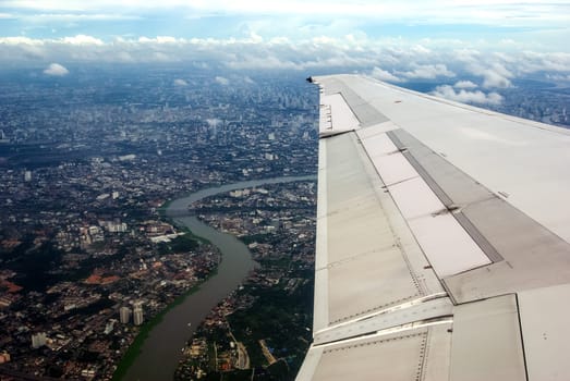 flying over Thailand, the view of Thailand from the window of the plane.
