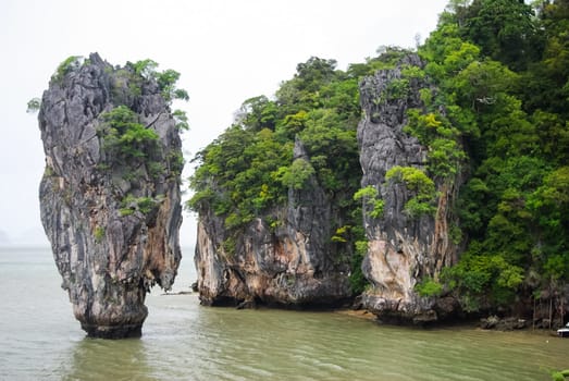 The nature of the coast of Thailand, cliffs near the sea, coastline and mountains.