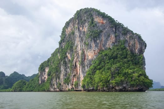 The nature of the coast of Thailand, cliffs near the sea, coastline and mountains.
