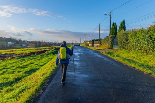 Galicia, Spain, 1 January, 2024: Pilgrim walk along the Camino De Santiago, the Way of St. James pilgrimage route, Galicia, Spain.