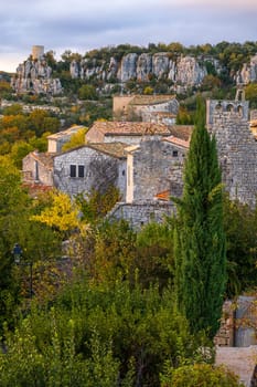 The medieval village of Balazuc over Ardèche river. Vertical photography taken in France