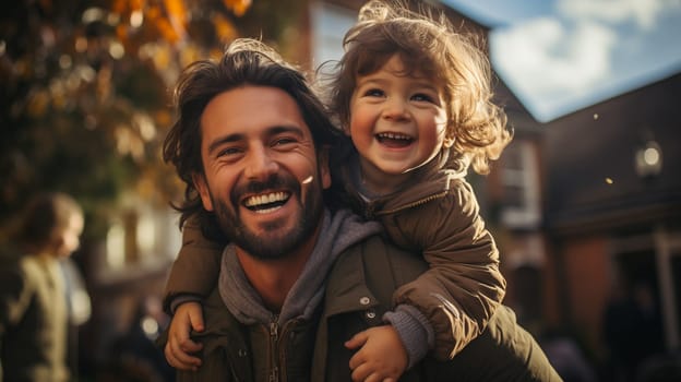 Happy Caucasian father with kid on his shoulders. Father giving son ride on his back in park