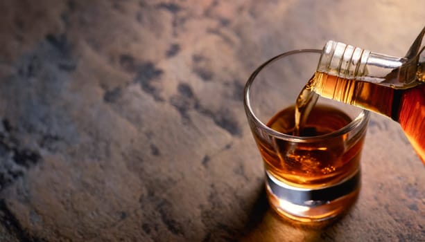 Pouring whiskey from bottle into glass on bar counter. AI generated