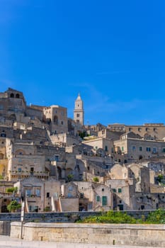 Matera, Italy - 6 May 2023: Old town of Matera (Sassi di Matera), Basilicata, southern Italy. Prehistoric cave dwellings