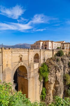Ronda, Andalusia, Spain - October 7, 2023: Famous new Roman Bridge "Puente Nuevo"" over the River Guadalevin."