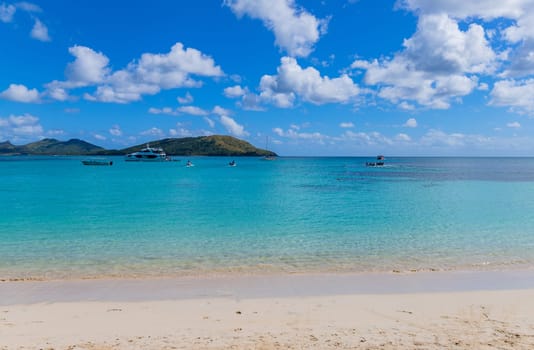 Nacula, Fiji: 26 May 2023: Tourist boats at the tropical sandy beach of Nacula island, Yasawa islands, Fiji, South Pacific Islands, Pacific