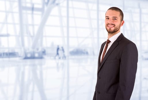 young business man portrait at the office