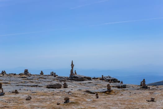Rocky and mountainous landscape with cairns at the highest point in Portugal in Serra da Estrela Natural Park