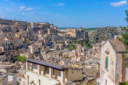 Matera, Italy - 6 May 2023: Old town of Matera (Sassi di Matera), Basilicata, southern Italy. Prehistoric cave dwellings