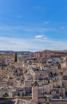 Matera, Italy - 6 May 2023: Old town of Matera (Sassi di Matera), Basilicata, southern Italy. Prehistoric cave dwellings