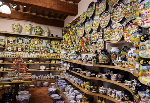 San Gimignano, Italy - Sept 17, 2022: Shop with typical Italian ceramics in San Gimignano. Tuscany, Italy