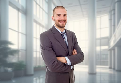 young business man portrait at the office