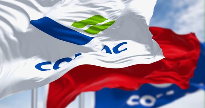 Shanghai, CH, May 2023: Flags of Comac and China waving in the wind. Comac is a Chinese state-owned aerospace manufacturer. Illustrative editorial 3d illustration render