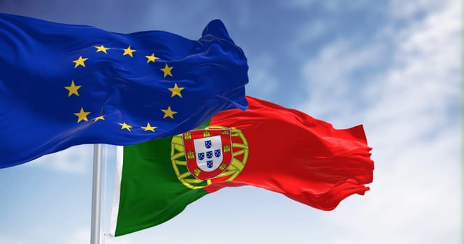 flags of Portugal waving with European Union flag on a clear day. Democracy and politics. Rippled textile, 3d illustration render. Selective focus