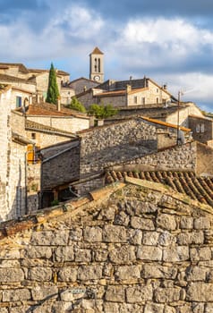 Balazuc village seen from the roofs, recognized as historical heritage and  member of The Most Beautiful Villages of France association. Vertical photography taken in France