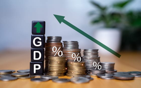 Gross domestic product, Financial, Management, Economic, Inflation, recession and Money concepts, GDP block with Coins stack and UP and Down arrow symbol icon.