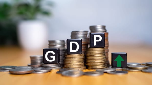 Gross domestic product, Financial, Management, Economic, Inflation, recession and Money concepts, GDP block with Coins stack and UP and Down arrow symbol icon.