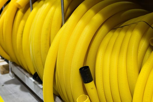 Large roll of a plastic corrugated pipe for insulating electrical wires